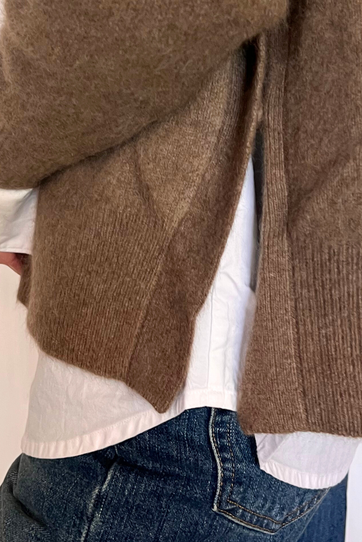 Maglia con bottoni laterali