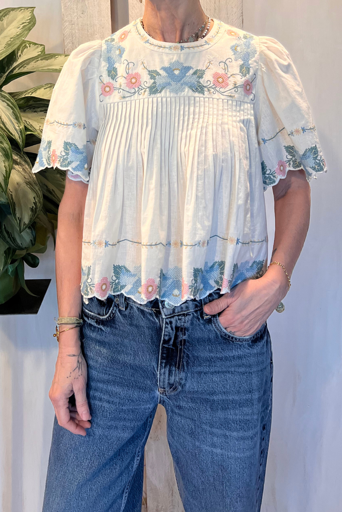 Blusa con ricami