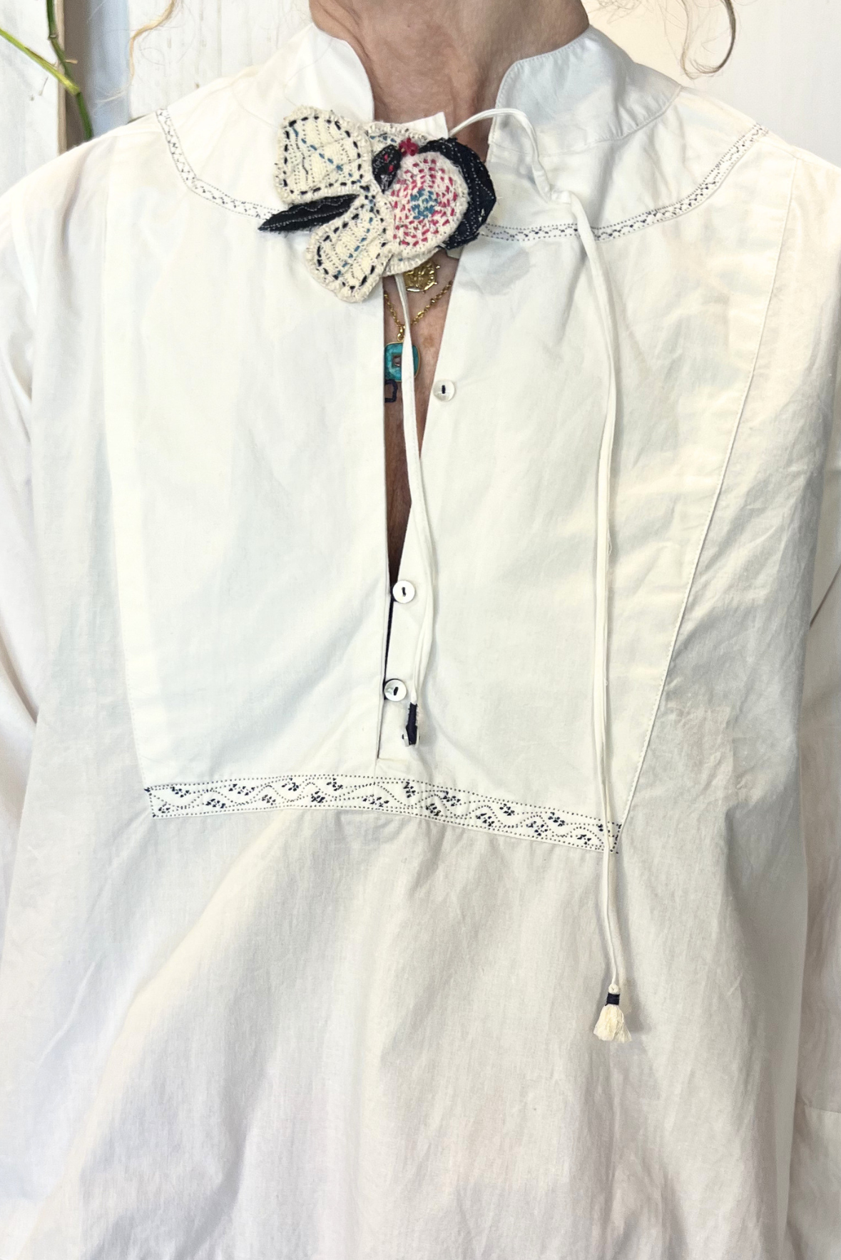 Blusa con ricami