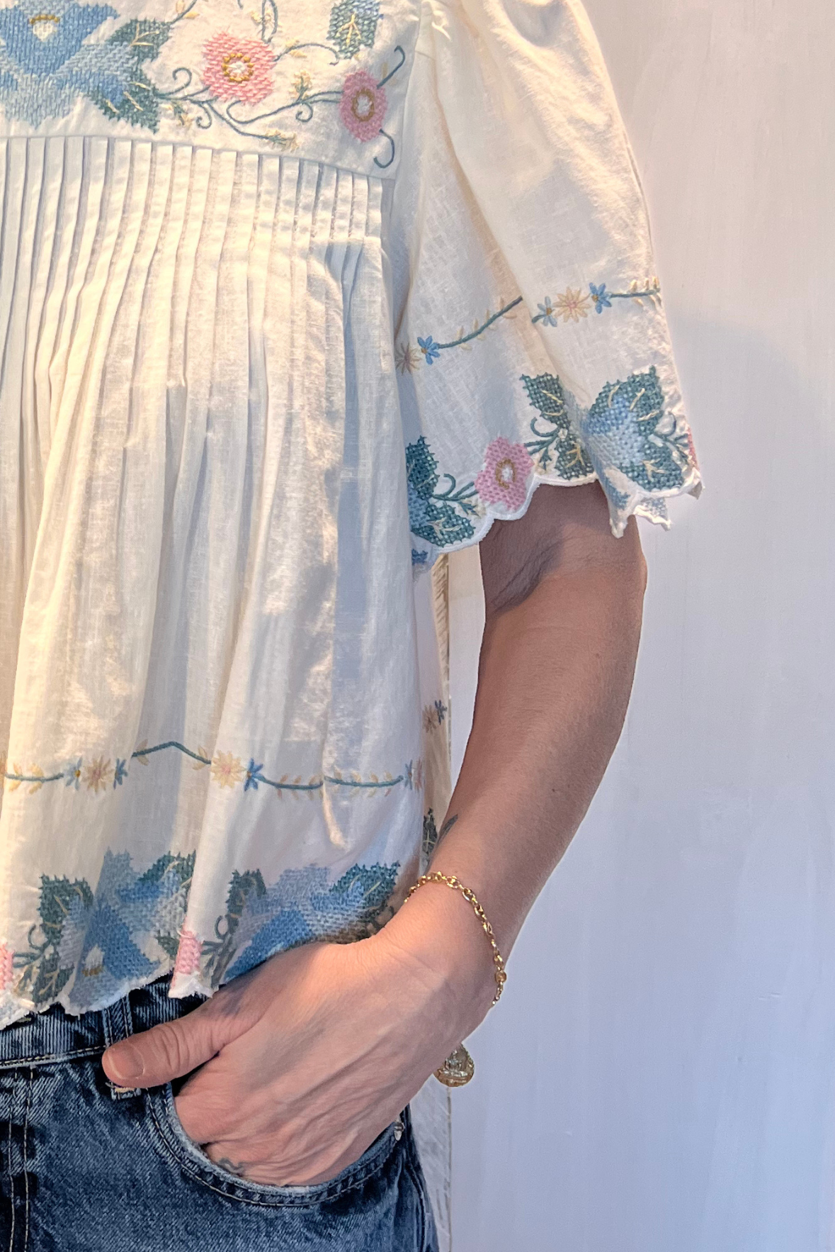 Blusa con ricami