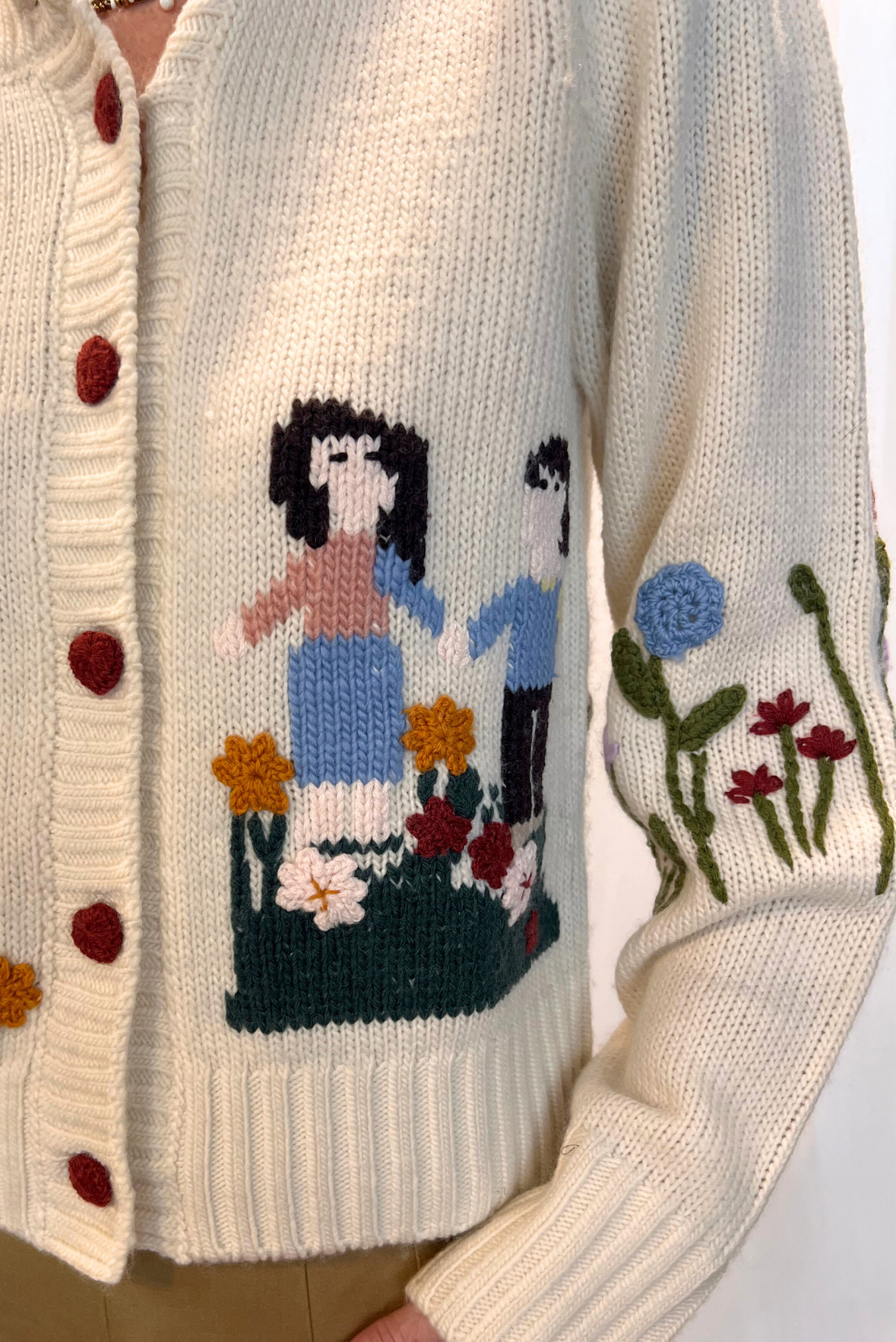 Cardigan con ricami