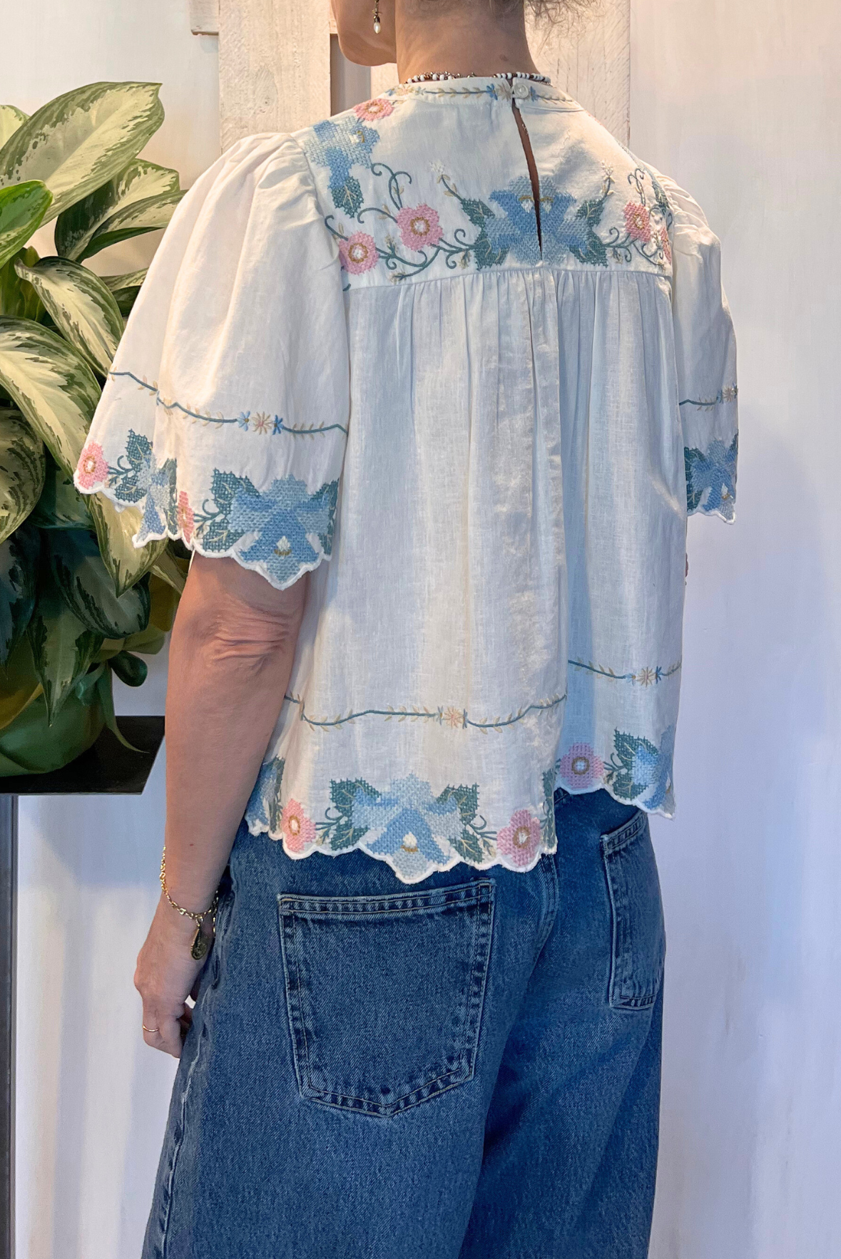 Blusa con ricami