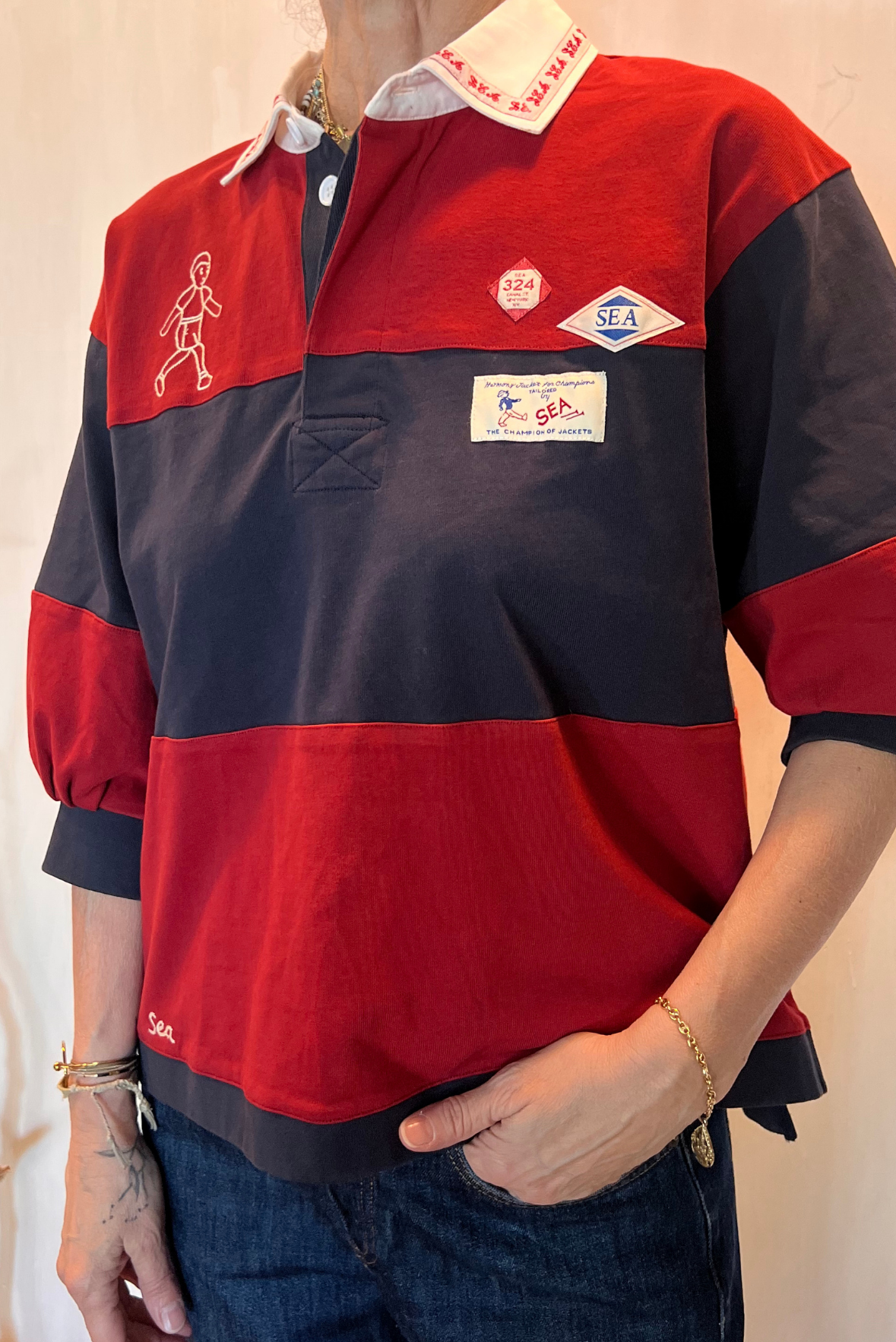Polo over con ricami