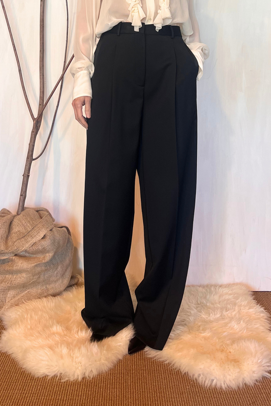 Pantalone smoking a palazzo