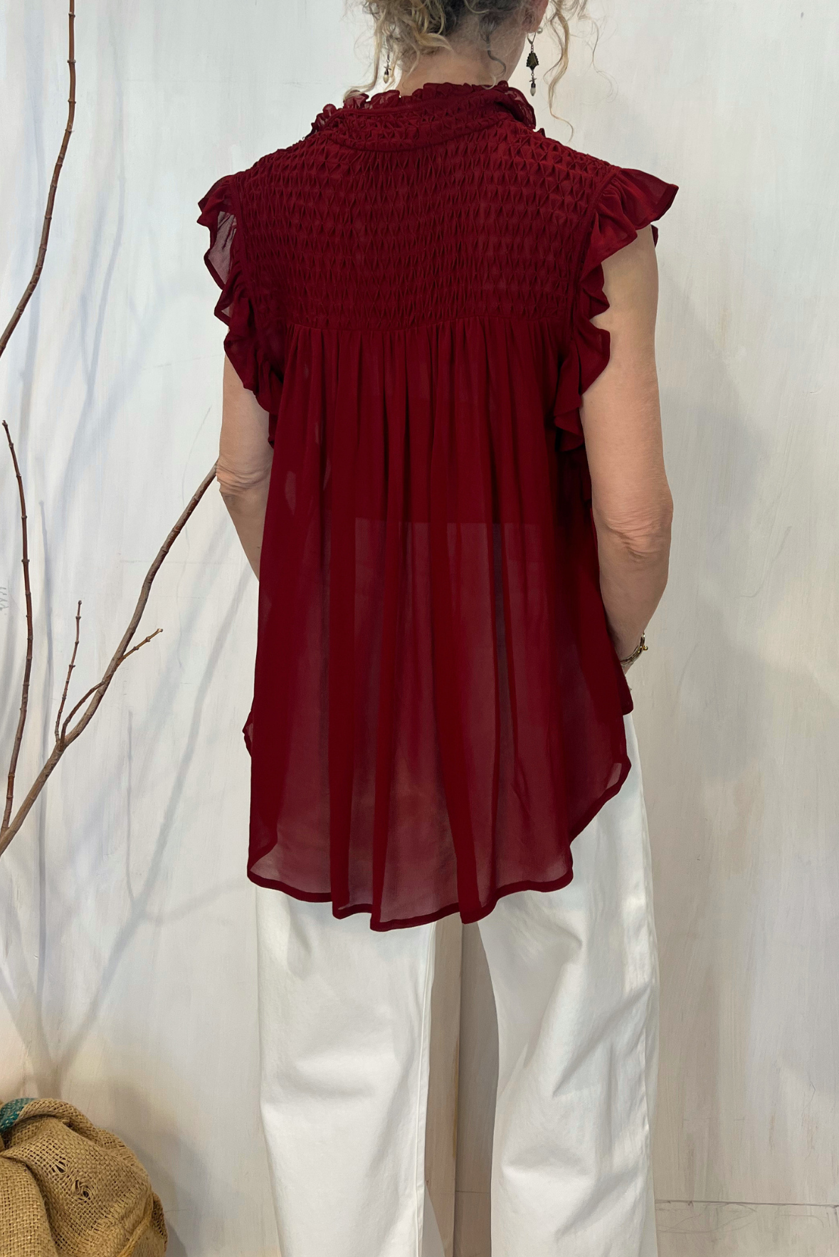 Top punto smock con rouches
