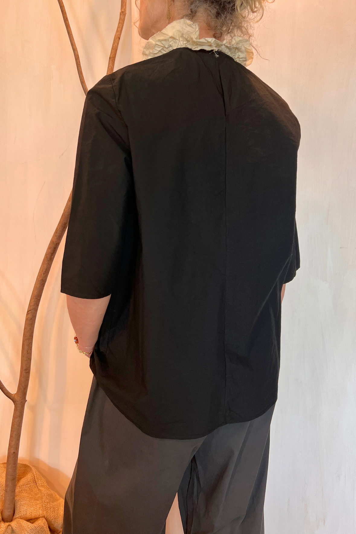 Blusa con rouches a contrasto