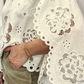 Blusa con pizzo e maxi maniche