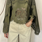 Blusa con pizzo e maxi maniche