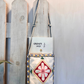 Borsa ricamata con tracolla