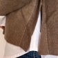 Maglia con bottoni laterali