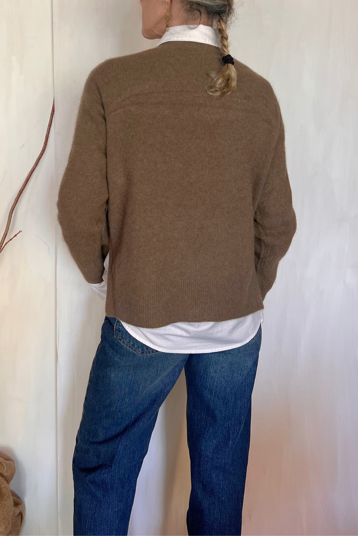 Maglia con bottoni laterali
