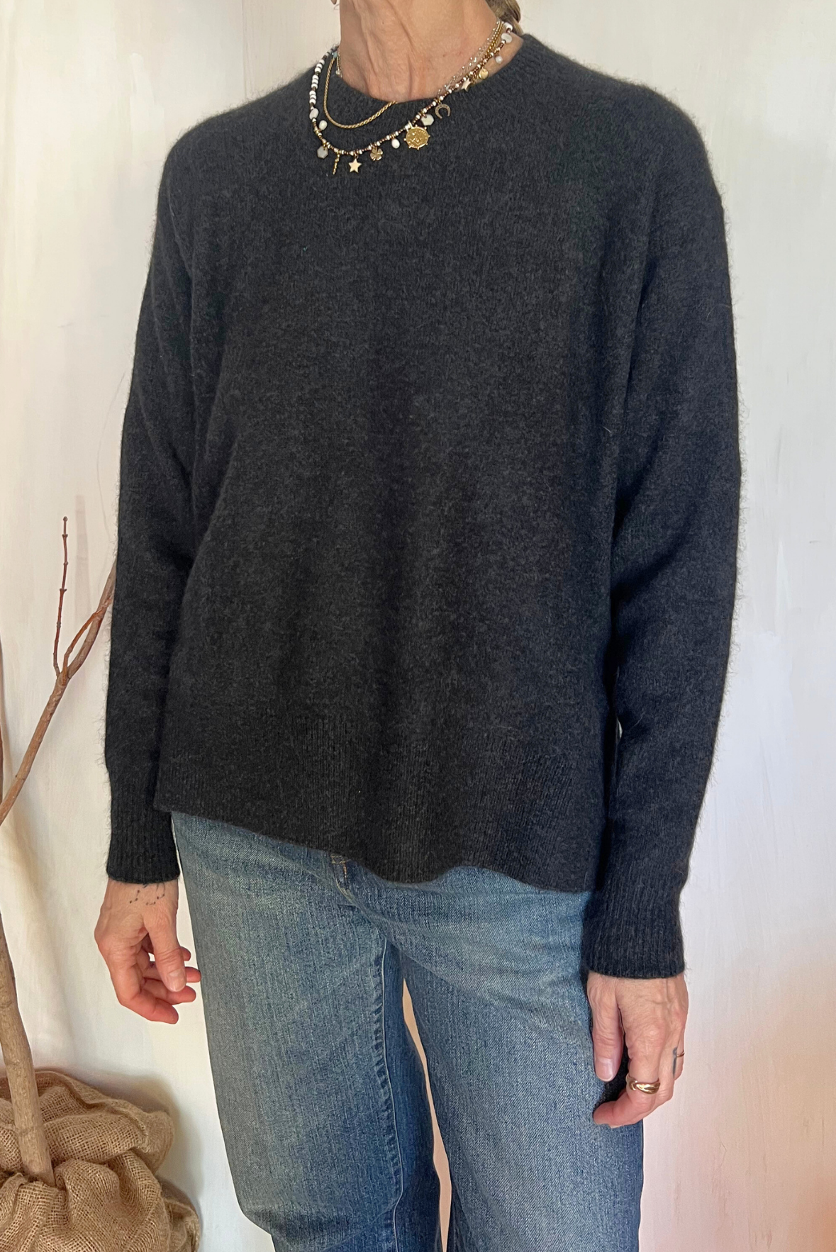Maglia con bottoni laterali