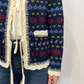 Maglia jaquard con pizzo e laccetti