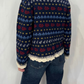 Maglia jaquard con pizzo e laccetti