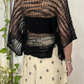 Top in maglia traforato