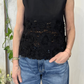 Top con pizzo