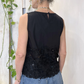 Top con pizzo