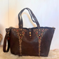 Shopper in pelle e borchie