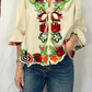 Camicia con ricami floreali