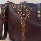 Shopper in pelle e borchie