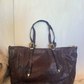 Shopper in pelle con fibbie texane