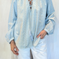 Blusa con ricami