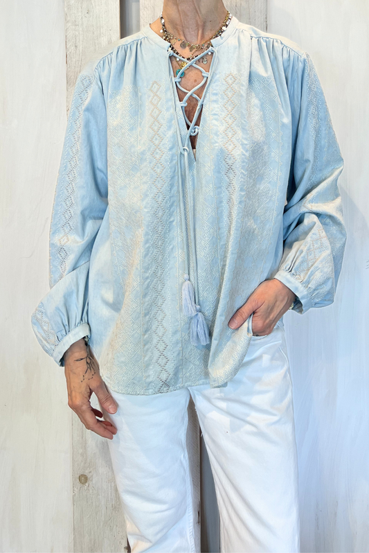 Blusa con ricami