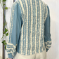 Camicia con ricami e nappine
