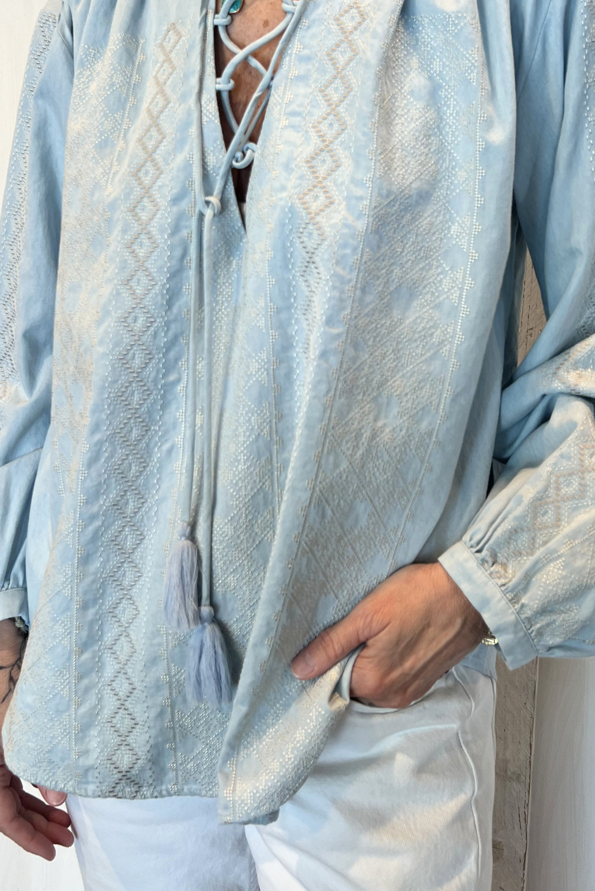 Blusa con ricami