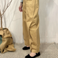Pantalone balloon con cintura in pelle