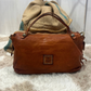 Borsa in pelle con frangine borchiate