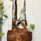 Borsa in pelle laserata
