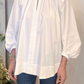 Blusa over maniche a palloncino