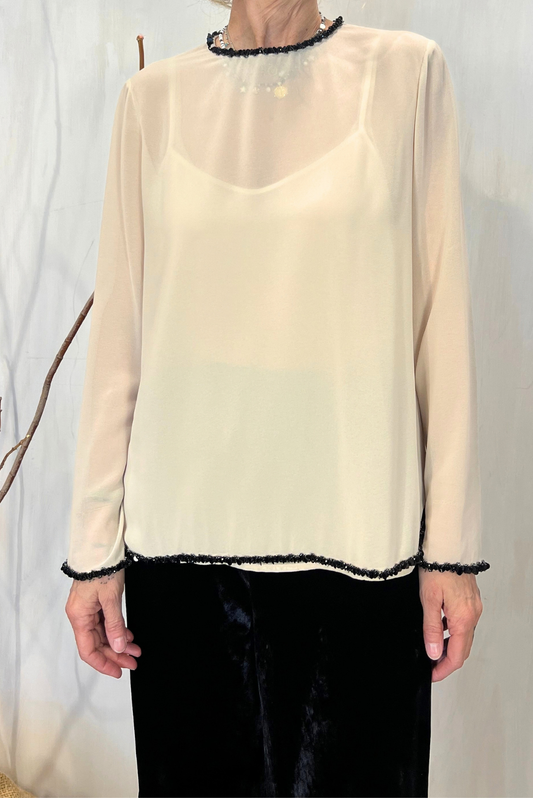 Top con bordini paillettes
