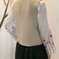 Gilet con bottoni