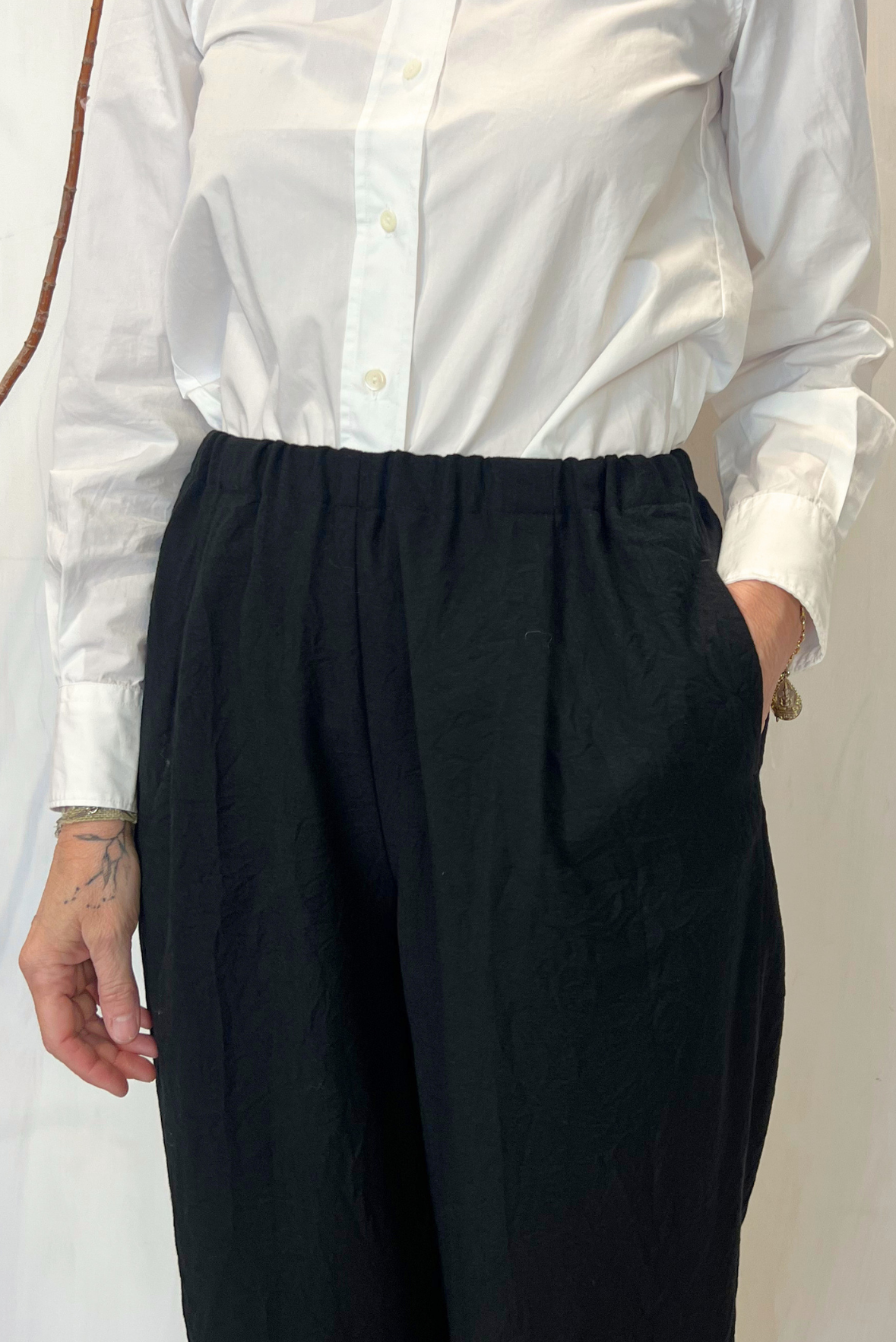 Pantalone con pinces in lana