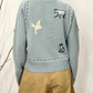 Cardigan iin lana con ricami e toppe