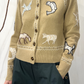 Cardigan iin lana con ricami e toppe