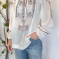 Blusa over con ricami