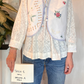 Gilet con ricami e laccetto
