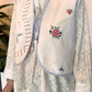 Gilet con ricami e laccetto