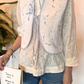 Gilet con ricami e laccetto