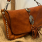 Borsa Artemisia con fibbie texane e frangine