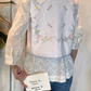 Gilet con ricami e laccetto
