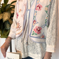 Gilet con ricami e laccetto