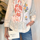Gilet con ricami a contrasto