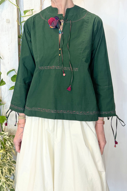 Blusa con ricami