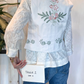 Gilet con ricami a contrasto