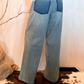Jeans con maxi ricami e applicazioni