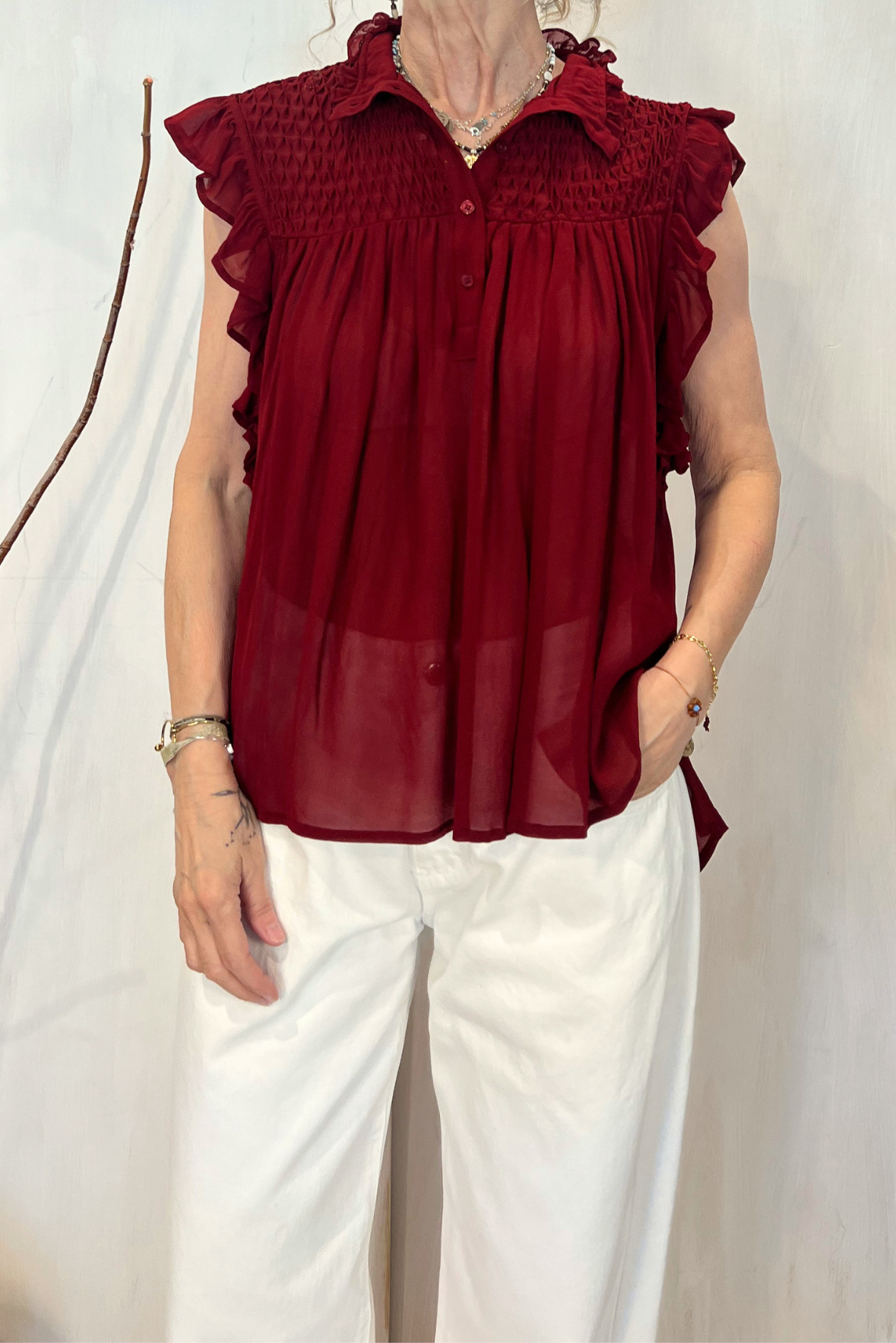 Top punto smock con rouches